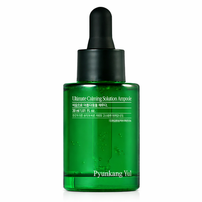 Green ampoule bottle with dropper labeled 'Pyunkang Yul' on a white background