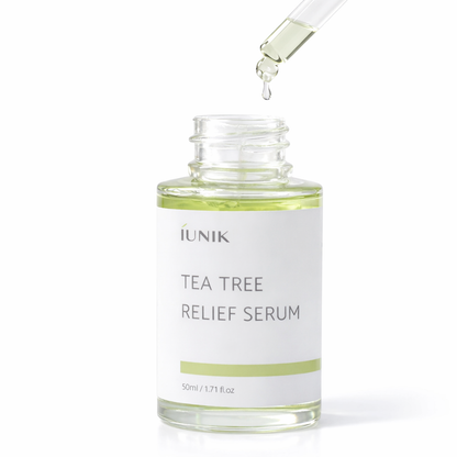 IUNIK Tea tree relief serum bottle with dropper on a white background
