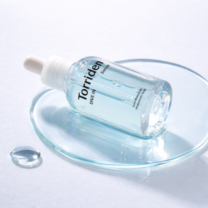 Torriden serum bottle on a white background
