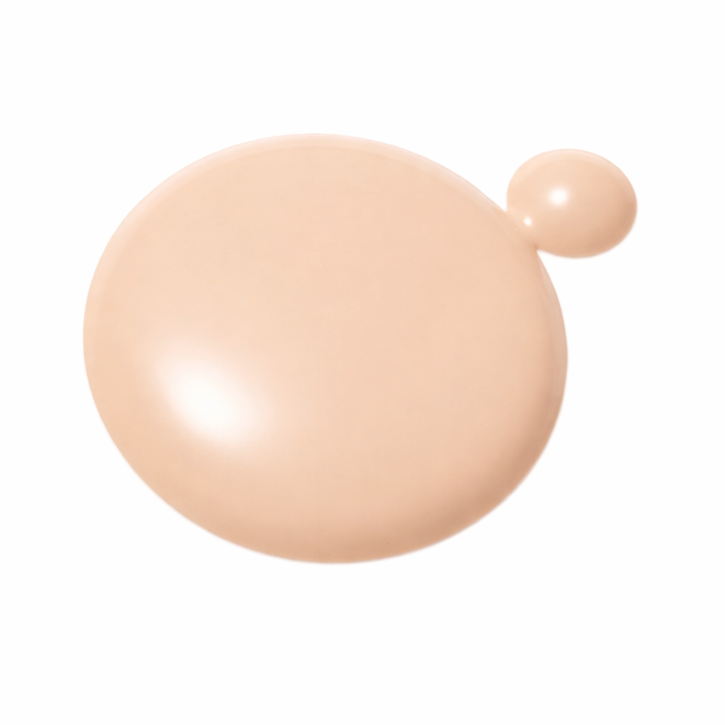 Beige cosmetic cream on a white background